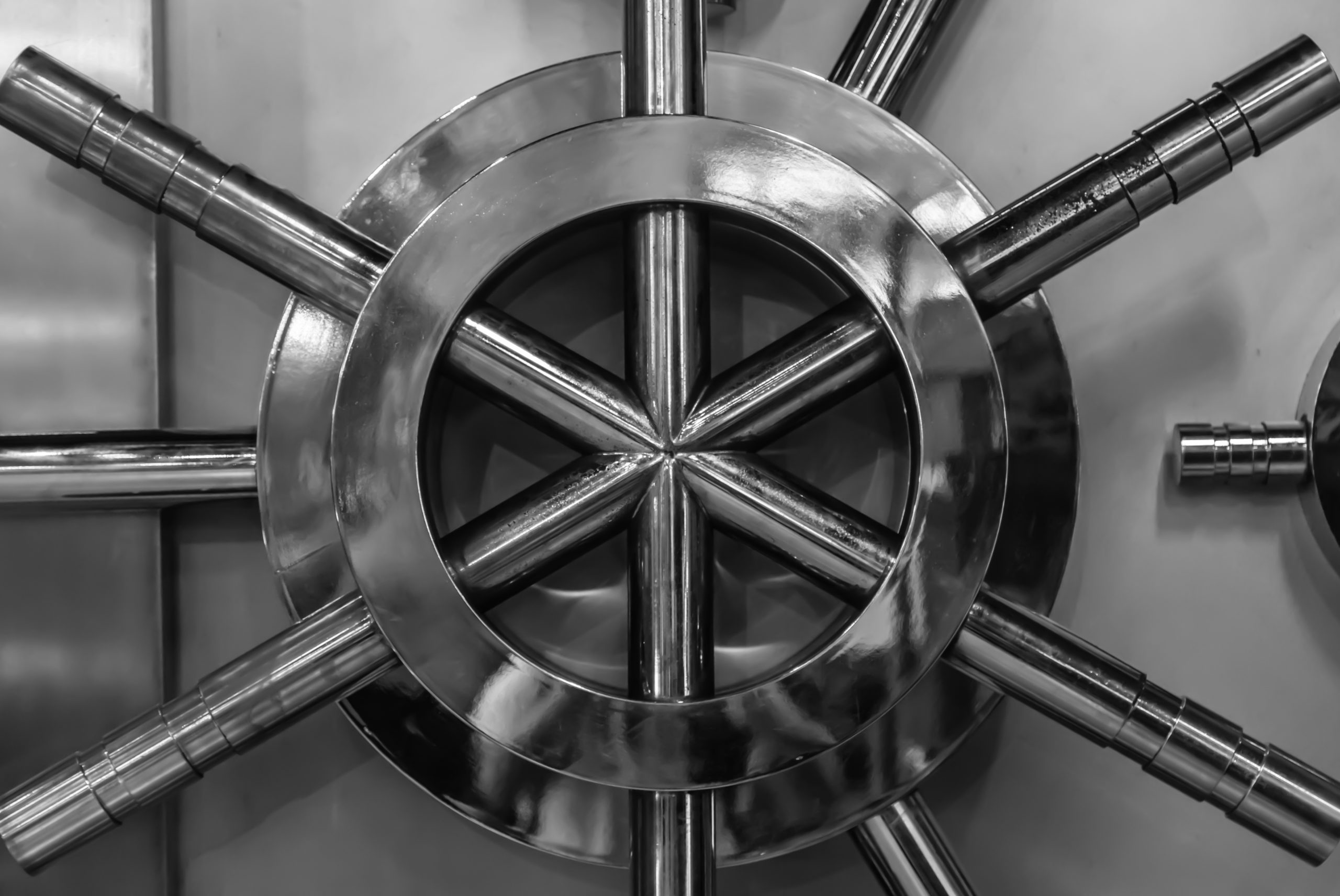 silver color bank security door facade closeup